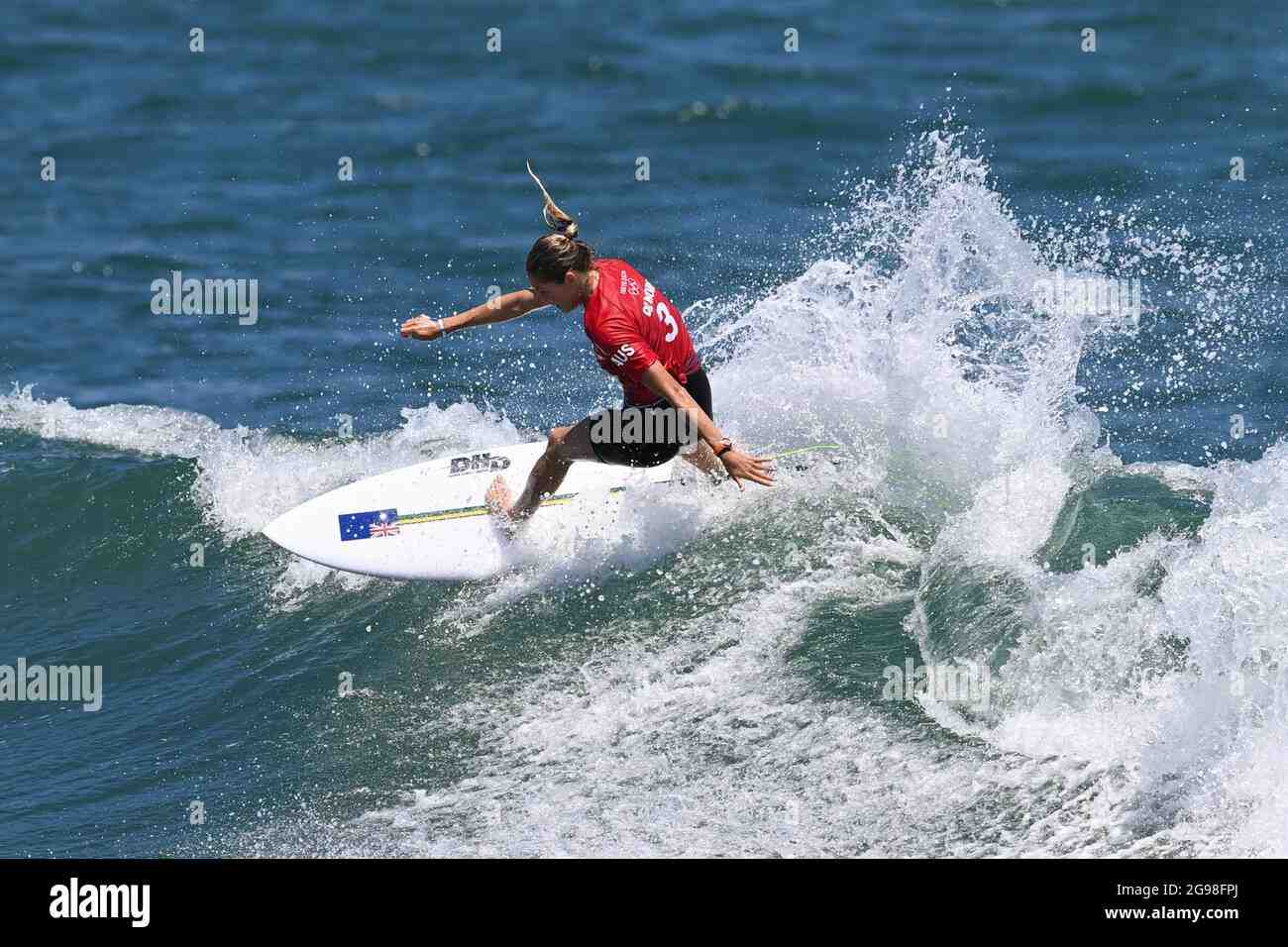 When did Mick Fanning start surfing?